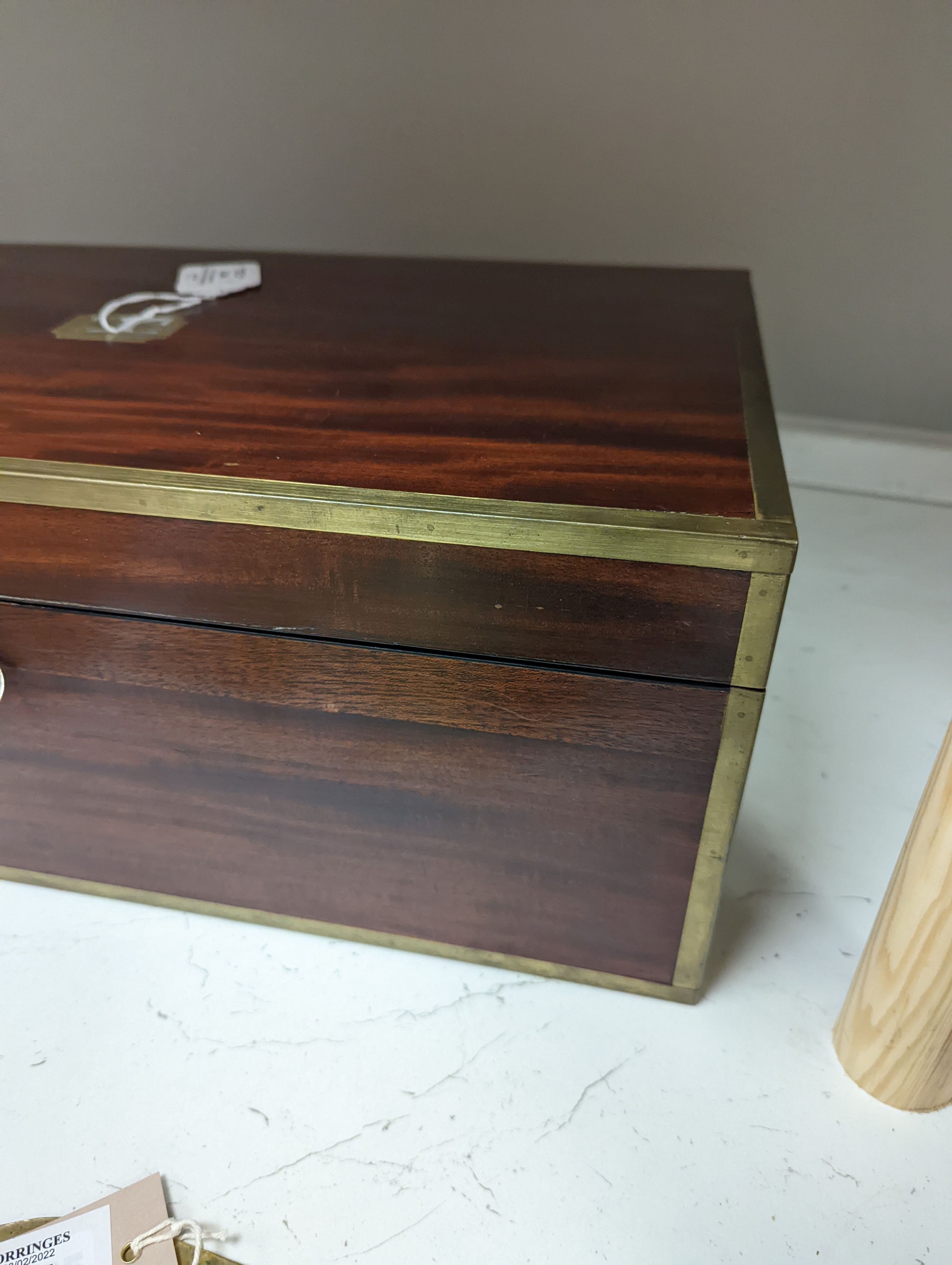 A 19th century mahogany and brass mounted writing slope, 51cm
